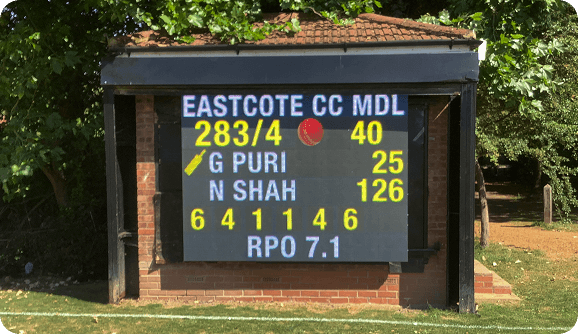 Custom scoreboard installation with tailored design and framing.